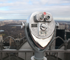Binoculars looking over a city